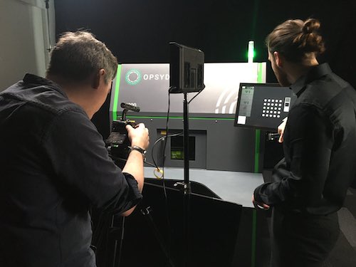 2 people filming a live action video shoot